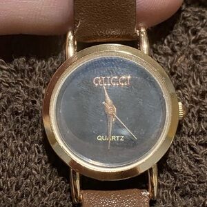 Gucci Gold Tone and Brown Leather Watch
